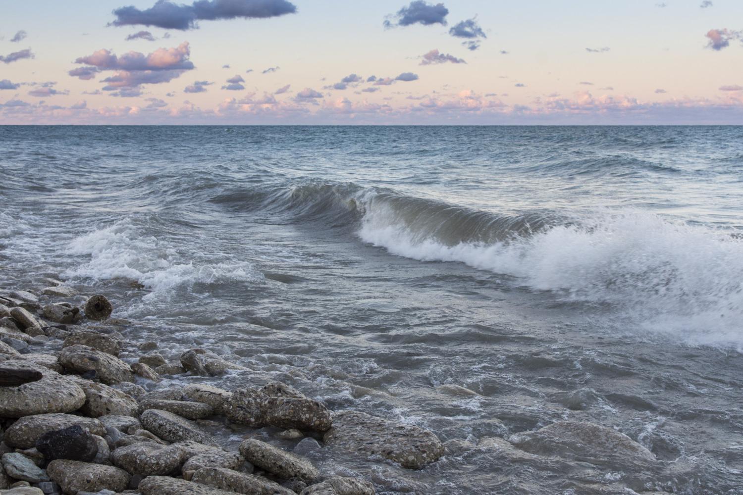 The sun rises over Lake Michigan on the <a href='http://61zn.lengyileng.com'>博彩网址大全</a> campus.